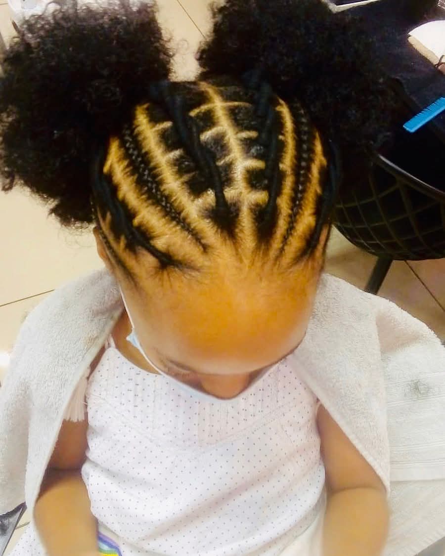 Kids stitch braids with two natural afro puffs